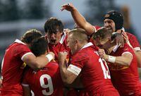 Canada's Kyle Baillie, centre, celebrates with teammates after a try against Chile during the second half of a Rugby World Cup 2023 qualification match at Starlight Stadium in Langford, B.C., on Saturday, October 2, 2021. THE CANADIAN PRESS/Chad Hipolito