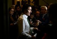 Prime Minister Justin Trudeau speaks to reporters before heading into a meeting of the Liberal caucus, on Parliament Hill in Ottawa, on Wednesday, March 8, 2023. THE CANADIAN PRESS/Justin Tang