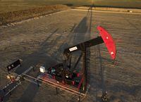 The organization representing Canada's oil and gas drilling sector says it expects more activity in 2023. A pumpjack draws out oil and gas from a well head as the sun sets near Calgary, Alta., Sunday, Oct. 9, 2022. THE CANADIAN PRESS/Jeff McIntosh