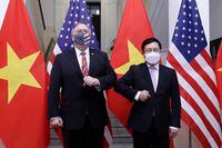 U.S. Secretary of State Mike Pompeo, left, and Vietnamese Foreign Minister Pham Binh Minh pose for a photo before a meeting in Hanoi, Vietnam, on Oct. 30, 2020.
