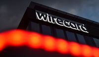 The logo of German payments provider Wirecard is seen at a building of the company's headquarters in Aschheim near Munich, southern Germany, on September 2, 2020. - Germany is poised to launch a full parliamentary inquiry into the collapse of payments provider Wirecard, as questions mount on how the government failed to prevent the country's biggest post-war financial scandal. After grilling members of Chancellor Angela Merkel's cabinet behind closed doors, opposition lawmakers on parliament's finance committee said they have no choice but to up the ante and seek a full inquiry. (Photo by Christof STACHE / AFP) (Photo by CHRISTOF STACHE/AFP via Getty Images)
