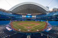 The Toronto Blue Jays play an MLB intrasquad baseball game in a nearly empty Rogers Centre in Toronto, Thursday, July 9, 2020. Rogers Communications Inc. says it was exploring the future of its Toronto stadium prior to the COVID-19 pandemic, but now the virus has caused it to de-prioritize the matter. THE CANADIAN PRESS/Carlos Osorio