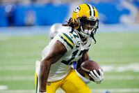 FILE - Green Bay Packers wide receiver Davante Adams runs during the first half of an NFL football game against the Detroit Lions on Jan. 9, 2022, in Detroit. (AP Photo/Duane Burleson, File)