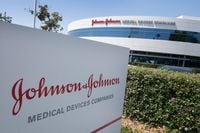 (FILES) In this file photo taken on August 28, 2019 the entry sign to the Johnson & Johnson campus shows their logo in Irvine, California. - Four drugmakers, including Johnson & Johnson, went on trial April 19, 2021 over claims they helped fuel the deadly opioid epidemic in the United States through deceptive marketing that downplayed the risks of addiction.
J&J, Teva, Endo and Allergan are accused of trivializing the dangers of long-term use of opioid painkillers to boost sales in a lawsuit filed by several California counties and the city of Oakland. The complaint seeks billions of dollars in damages to abate the public nuisance it says the drugmakers created. (Photo by Mark RALSTON / AFP) (Photo by MARK RALSTON/AFP via Getty Images)