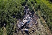 Debris is seen at the crash site of an Antonov An-12 cargo plane owned by a Ukrainian company, near Kavala, Greece, July 17, 2022. REUTERS/Alkis Konstantinidis