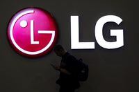 A man walks past an LG logo at the Mobile World Congress in Barcelona on Feb. 27, 2018.