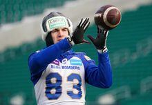 Winnipeg Blue Bombers wide receiver Dalton Schoen catches a football during a walkthrough ahead of the 109th Grey Cup at Mosaic Stadium in Regina, Saturday, Nov. 19, 2022. Schoen has a tough act to follow this season with the Blue Bombers. His own.THE CANADIAN PRESS/Heywood Yu