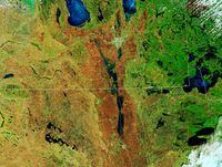 Flooding along the Red River on both sides of the Manitoba and Minnesota border is seen in false colour as observed by the Terra satellite in a May 10, 2022, handout image. THE CANADIAN PRESS/HO-NASA Earth Observatory, Lauren Dauphin, *MANDATORY CREDIT*