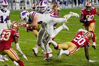 Buffalo Bills tight end Dawson Knox is hit by San Francisco 49ers free safety Jimmie Ward, right, during the second half on Dec. 7, 2020, in Glendale, Ariz. The Bills won 34-24.