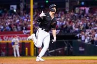 Arizona Diamondbacks' Alek Thomas rounds the bases after a two-run home run against the Philadelphia Phillies during the eighth inning in Game 4 of the baseball NL Championship Series in Phoenix, Friday, Oct. 20, 2023. (AP Photo/Ross D. Franklin)