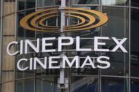 FILE PHOTO: A Cineplex movie theatre sign looms over Yonge street in Toronto, Ontario, Canada March 16, 2020.  REUTERS/Chris Helgren/File Photo