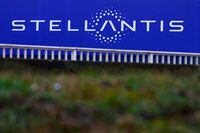 FILE PHOTO: The logo of Stellantis is seen on a company's building in Velizy-Villacoublay near Paris, France, February 1, 2022. REUTERS/Gonzalo Fuentes/File Photo