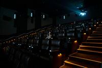 Movie goers sit in a theatre at a Cineplex in Toronto, on Tuesday, October 6, 2020. THE CANADIAN PRESS/Chris Young