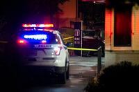 FILE Ñ A police car on Oct. 4, 2018, sits in the McDonaldÕs drive-through in the Bronx where Sylvester Zottola was fatally shot in a plot hatched by his son Anthony.  The younger Zottola was convicted last year of murder-for-hire and conspiracy, and on Friday, April 14, 2023, a federal judge sentenced him to life in prison, the mandatory minimum. (Gregg Vigliotti/The New York Times)