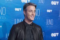 Ben Mulroney poses on the red carpet as he arrives at the Juno Awards show, in Ottawa, on April 2, 2017.
