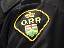 A coalition of northwestern Ontario mayors say the further discounts they are receiving by the province's solicitor general on the price they pay for policing is still not enough to cover a policing cost crisis jurisdictions across the north are facing. An Ontario Provincial Police logo is shown during a press conference, in Barrie, Ont., on Wednesday, April 3, 2019. THE CANADIAN PRESS/Nathan Denette