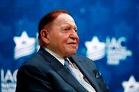 FILE - In this Dec. 7, 2019, file photo, Las Vegas Sands Corporation Chief Executive Sheldon Adelson sits onstage before President Donald Trump speaks at the Israeli American Council National Summit in Hollywood, Fla. Adelson and his wife have given $75 million to a new super PAC that is attacking Democratic nominee Joe Biden, an investment made amid GOP concern that President Donald Trump's campaign is flailing and might not be able to correct course. (AP Photo/Patrick Semansky, File)