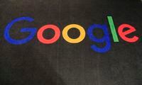 FILE - The logo of Google is displayed on a carpet at the entrance hall of Google France in Paris, Nov. 18, 2019. Germany's antitrust watchdog paved the way Wednesday Jan. 5, 2022, for extra scrutiny of Google by designating it a company of “paramount significance," the first since rules took force that give regulators more power to curb abusive practices by big digital companies. (AP Photo/Michel Euler, File)
