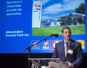 Brian Hannasch, the new CEO of Alimentation Couche-Tard, does a run-through of his speech before the Alimentation Couche-Tard annual general meeting in Toronto on Wednesday, Sept. 24, 2014. THE CANADIAN PRESS/Hannah Yoon
