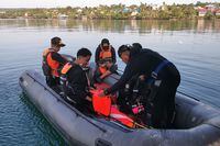 This handout photo from Indonesia's National Rescue Agency (Basarnas) taken and released on July 24, 2023 shows members of a rescue team setting out to conduct search and rescue operations in Buton Tengah, southwest Sulawesi after a ferry sank. At least 15 people were killed and 19 more were missing on July 24 after a ferry sank off the coast of Indonesia's Sulawesi island, search and rescue officials said. (Photo by Handout / BASARNAS / AFP) / -----EDITORS NOTE --- RESTRICTED TO EDITORIAL USE - MANDATORY CREDIT "AFP PHOTO / INDONESIA'S NATIONAL RESCUE AGENCY (BASARNAS) " - NO MARKETING - NO ADVERTISING CAMPAIGNS - DISTRIBUTED AS A SERVICE TO CLIENTS (Photo by HANDOUT/BASARNAS/AFP via Getty Images)