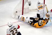Florida Panthers center Carter Verhaeghe (23) beats Boston Bruins goaltender Linus Ullmark (35) for a goal during the third period of Game 2 in the first round of the NHL hockey playoffs Wednesday, April 19, 2023, in Boston. (AP Photo/Charles Krupa)