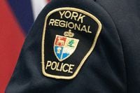 York police have charged two 13-year-old girls with assault after a teen girl was stabbed in an altercation in a Vaughn parking lot on Saturday.&nbsp;A York Regional Police patch is shown Dec, 19, 2022. THE CANADIAN PRESS/Arlyn McAdorey