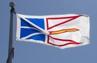 Newfoundland and Labrador's provincial flag flies on a flagpole in Ottawa on July 6, 2020. The Newfoundland and Labrador government is opening an office in India in an effort to recruit more nurses. THE CANADIAN PRESS/Adrian Wyld