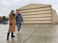 Canadian Foreign Minister Mélanie Joly speaks with Eduart Dodu, the deputy commander of the Mihail Kogalniceanu airbase in Romania, where Canada has stationed two large tent-like structures, on March 7, 2022. Nathan Vanderklippe/The Globe and Mail