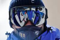 Beijing 2022 Winter Paralympic Games - Para Snowboard - Training - Genting Snow Park, Zhangjiakou, China - March 4, 2022. An athlete of Italy is seen with teammates ahead of the Beijing 2022 Winter Paralympic Games REUTERS/Issei Kato