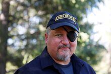 FILE PHOTO: Oath Keepers militia founder Stewart Rhodes poses during an interview session in Eureka, Montana, U.S. June 20, 2016. REUTERS/Jim Urquhart/File Photo