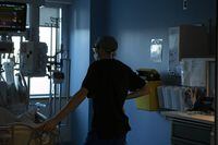 An assistant nursing professor at the University of New Brunswick says there is a crisis-level shortage of sexual assault nurse examiners in the country. A nurse tends to a patient at the Bluewater Health Hospital in Sarnia, Ont., on Wednesday, Jan, 26, 2022. THE CANADIAN PRESS/Chris Young