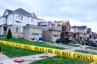 Damage left after a tornado touched down in a neighbourhood in Barrie, Ont., on Thursday, July 15, 2021. THE CANADIAN PRESS/Christopher Katsarov
