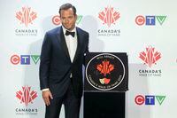Actor Will Arnett is pictured with his star as he is inducted into Canada's Walk of Fame during an event in Toronto on Saturday, November 23, 2019. THE CANADIAN PRESS/Chris Young