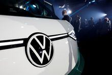 The VW logo is seen on the ID. Buzz, a fresh take on the iconic vehicle of the Volkswagen brand, during its world premiere in Paris, France, March 9, 2022. REUTERS/Benoit Tessier