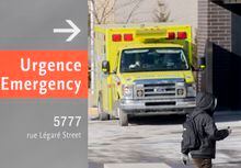 An ambulance is shown outside a hospital in Montreal, Saturday, January 15, 2022, as the COVID-19 pandemic continues in Canada. THE CANADIAN PRESS/Graham Hughes