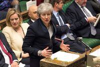 A handout photograph taken and released by the U.K. Parliament on April 3, 2019, shows British Prime Minister Theresa May attending the weekly Prime Minister's Questions (PMQs) question and answer session in the House of Commons in London.