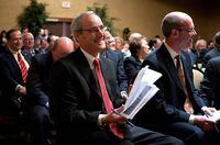 Derek Evans, centre, president and CEO of Pengrowth Energy Trust, laughs at a joke before addressing the company's annual meeting in Calgary on May 11, 2010. The retiring CEO of Pengrowth Energy Corp. says Canadian oil and gas leaders have been too “shy” to speak out in support of their industry and he plans to help fill that vacuum as he leaves the job he's held since 2009. Derek Evans, 61, says he blames himself as much as anyone for a disconnect between average Canadians and the industry in terms of pipeline and drilling technology safety, and the seeming inability of some to see how importing oil and gas hurts domestic producers. THE CANADIAN PRESS/Jeff McIntosh
