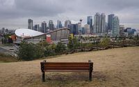 The Saddledome is seen from a hillside park in Calgary on Friday, Sept. 15, 2017. A group of Albertans says they have started to explore whether communities across the province could host the 2030 Commonwealth Games. THE CANADIAN PRESS/Jeff McIntosh