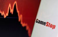 FILE PHOTO: GameStop logo is seen near displayed stock graph in this illustration taken February 2, 2021. REUTERS/Dado Ruvic/Illustration