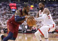 Cleveland Cavaliers forward LeBron James (23) moves to the basket against Toronto Raptors forward C.J. Miles (0) in game two of the second round of the 2018 NBA Playoffs at Air Canada Centre.