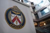 A logo at the Toronto Police Services headquarters, in Toronto, on Friday, August 9, 2019. A custodian has been arrested following an alleged sexual assault at a Toronto school earlier this year. THE CANADIAN PRESS/Christopher Katsarov