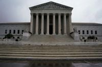 FILE PHOTO: The U.S. Supreme Court building is seen in the rain in Washington, U.S., October 2, 2022. REUTERS/Elizabeth Frantz/File Photo
