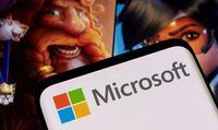 FILE PHOTO: Microsoft logo is seen on a smartphone placed on displayed Activision Blizzard's games characters in this illustration taken January 18, 2022. REUTERS/Dado Ruvic/Illustration