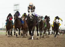 Jockey Daisuke Fukumoto rides Mighty Heart to victory during the running of the 161st Queen's Plate at Woodbine Racetrack in Toronto on Saturday, September 12, 2020. Woodbine Entertainment has hired longtime trainer Dan Vella as its Horse People Liaison. THE CANADIAN PRESS/Nathan Denette