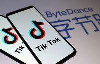 FILE PHOTO: Tik Tok logos are seen on smartphones in front of a displayed ByteDance logo in this illustration taken November 27, 2019. REUTERS/Dado Ruvic/Illustration/File Photo