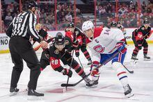 Jan 28, 2023; Ottawa, Ontario, CAN; Ottawa Senators right wing Claude Giroux (28) faces off against Montreal Canadiens center Nick Suzuki (14) in the second period at the Canadian Tire Centre. Mandatory Credit: Marc DesRosiers-USA TODAY Sports