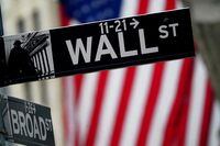 A Wall Street sign outside the New York Stock Exchange in New York City on Oct. 2, 2020.
