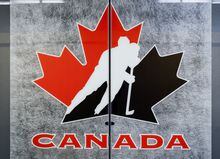 A Hockey Canada logo is seen on the door to a meeting room at the organizations head office in Calgary, Alta., Sunday, Nov. 6, 2022. ;Hockey Canada has hired human rights leader Irfan Chaudhry as its first vice-president, diversity and inclusion. THE CANADIAN PRESS/Jeff McIntosh