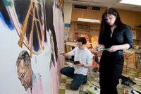 TORONTO, ONT.: May 5, 2011 -- (L to R) Grade 12 students Jean-Luc Lindsay, 18,  and Andrea Chartrand, 18, complete a painting at Etobicoke School for the Arts in Toronto, Ont., May 5, 2011...........Sarah Dea/For  The Globe and MailStory details: In the former science classrooms of a middle-aged high school in Toronto's west end, rows of canvases worth more than $1-million in scholarship money line yellowed laminate floors. They are the work of this year's graduating class of visual arts majors at the Etobicoke School of the Arts, a group of 19 students who won more than $1.53-million in scholarships this year from the likes of the School of the Art Institute of Chicago, the Pennsylvania Academy of Fine Art and the San Francisco Art Institute. As Canada's oldest free-standing arts-focused school, ESA has built a strong reputation. Admissions to ESA's visual arts department are competitive; there about 200 applicants for 50 spots each year. The school offers drama, musical theatre, dance, film and music majors too, and about 25 per cent of its students come from elementary schools outside the Toronto District School Board, most often private or Catholic ones.