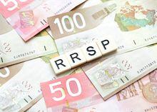 Vancouver, Canada -- October 22, 2011: Close up of letter tiles spelling out RRSP on Canadian Currency symbolizing a RRSP retirement contribution.